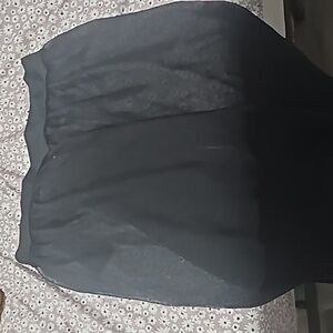 Long cover-up skirt that is black and transparent